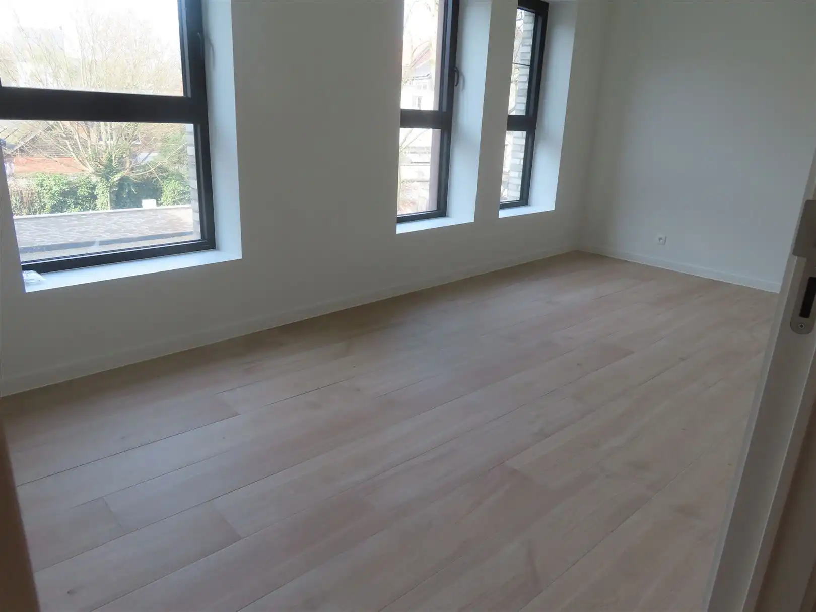 Prachtig nieuwbouwappartement met 2slpk, 2 badk, terras & P foto 10