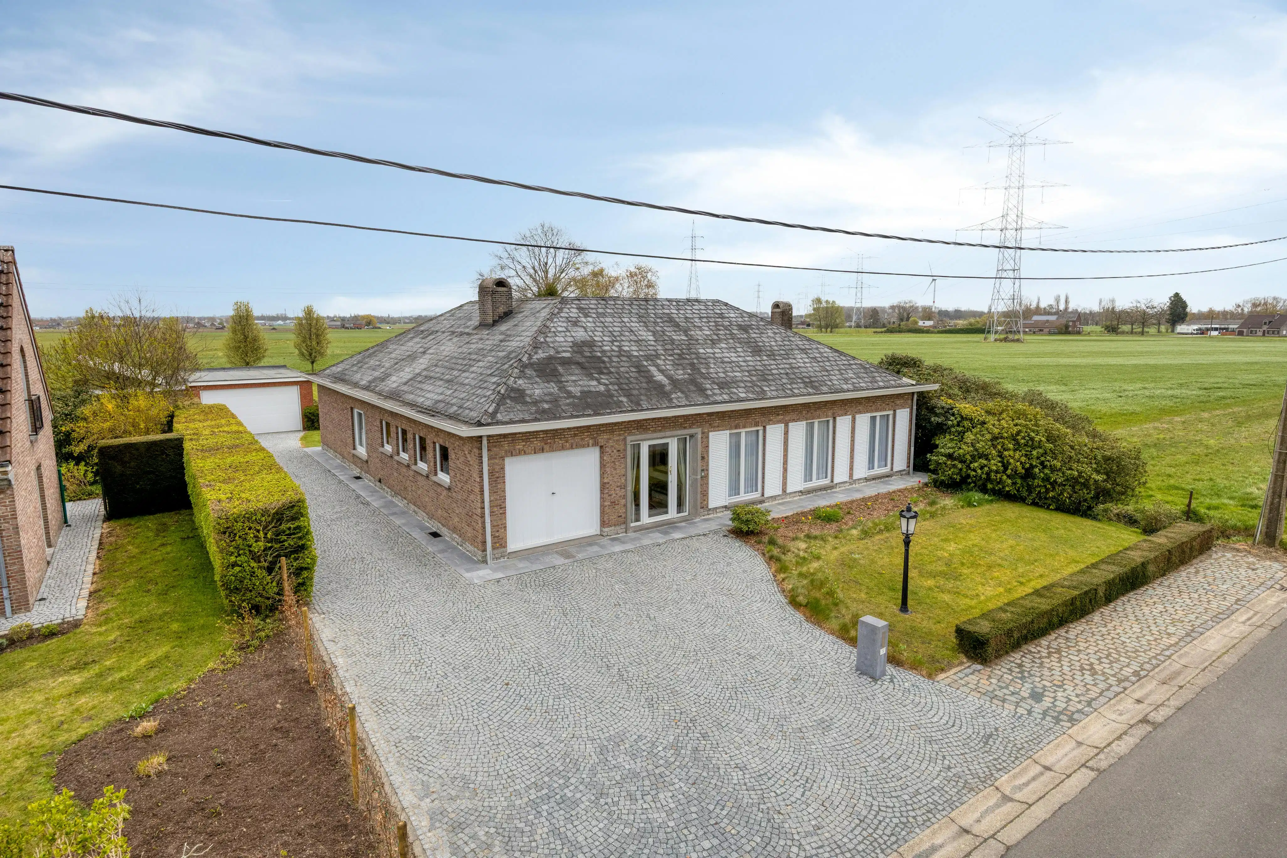 Landelijke laagbouw villa te koop in Reet op 2.500 m² foto 31