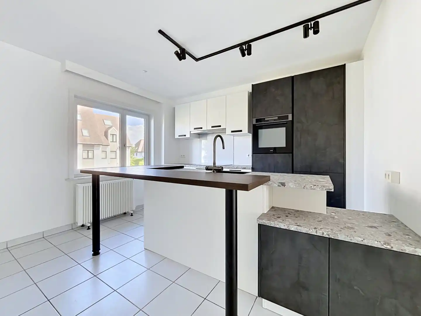 Ruim duplex appartement met 4 slaapkamers en 2 badkamers foto 5