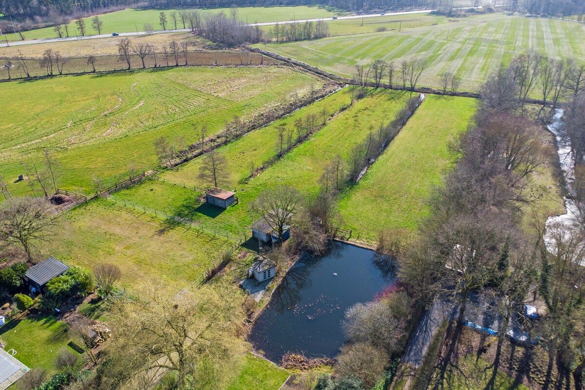 Goed onderhouden ruim ingedeelde woning op 11.725 m². foto 40