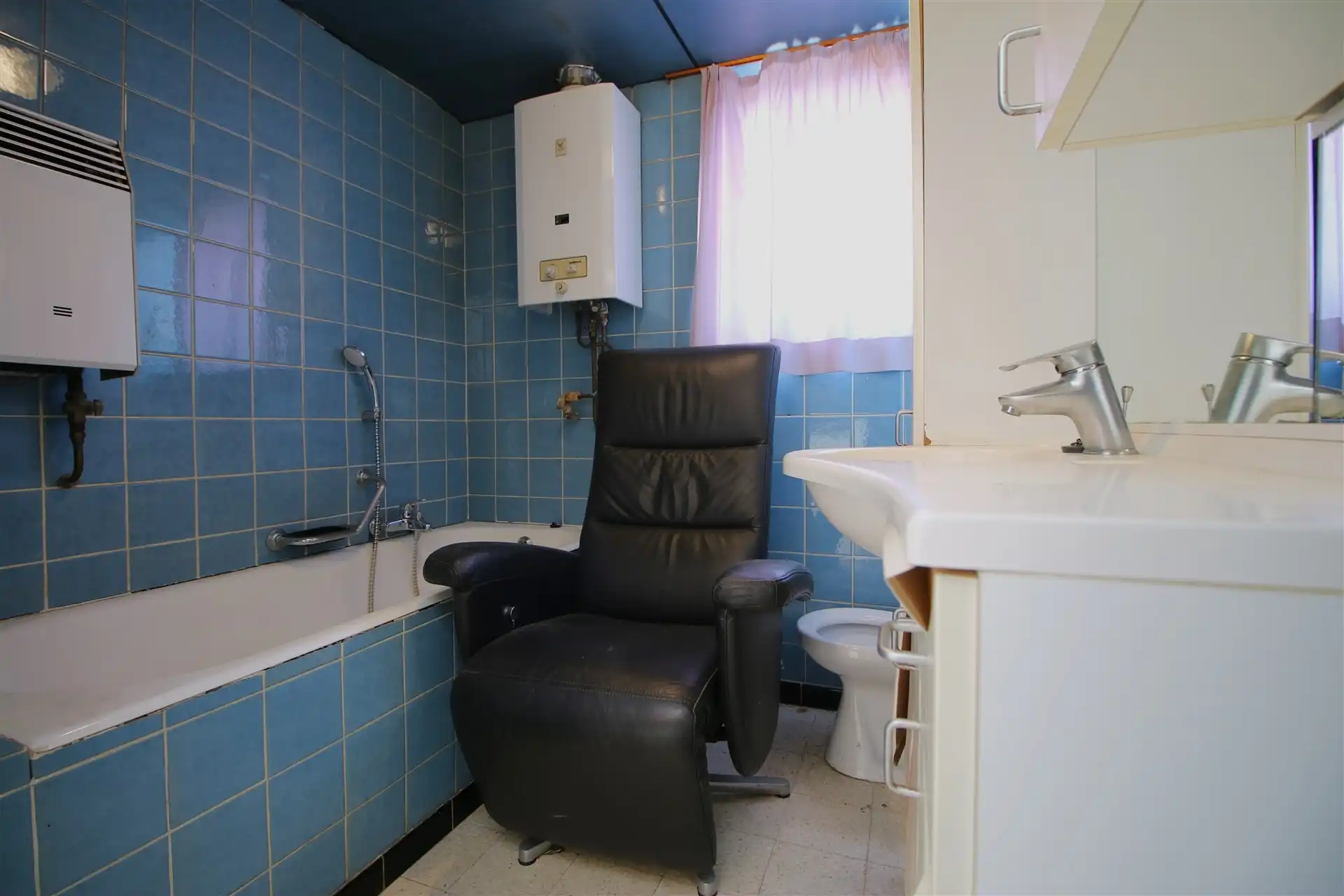 Te renoveren woning in doodlopende straat foto 11