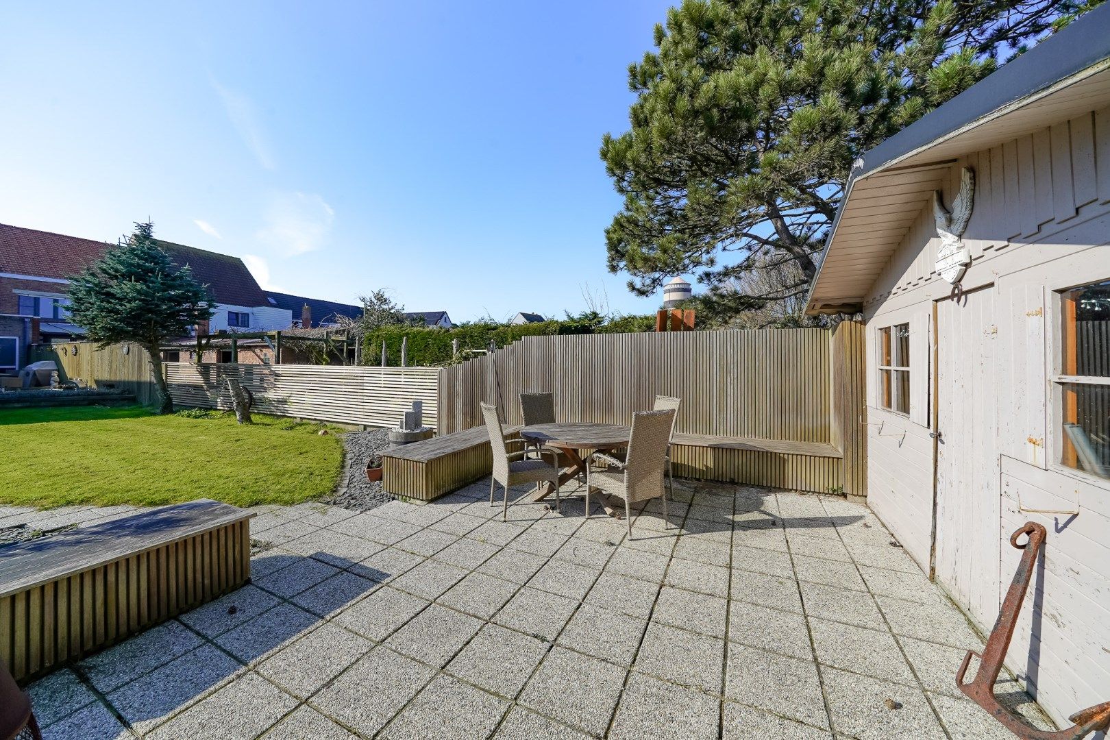 Gezinswoning met diepe tuin en uitweg achteraan foto 4