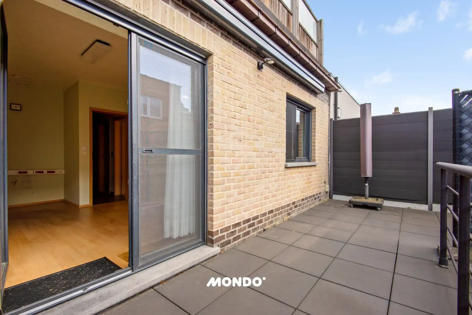 Gelijkvloers appartement met staanplaats en kelderberging! foto 13