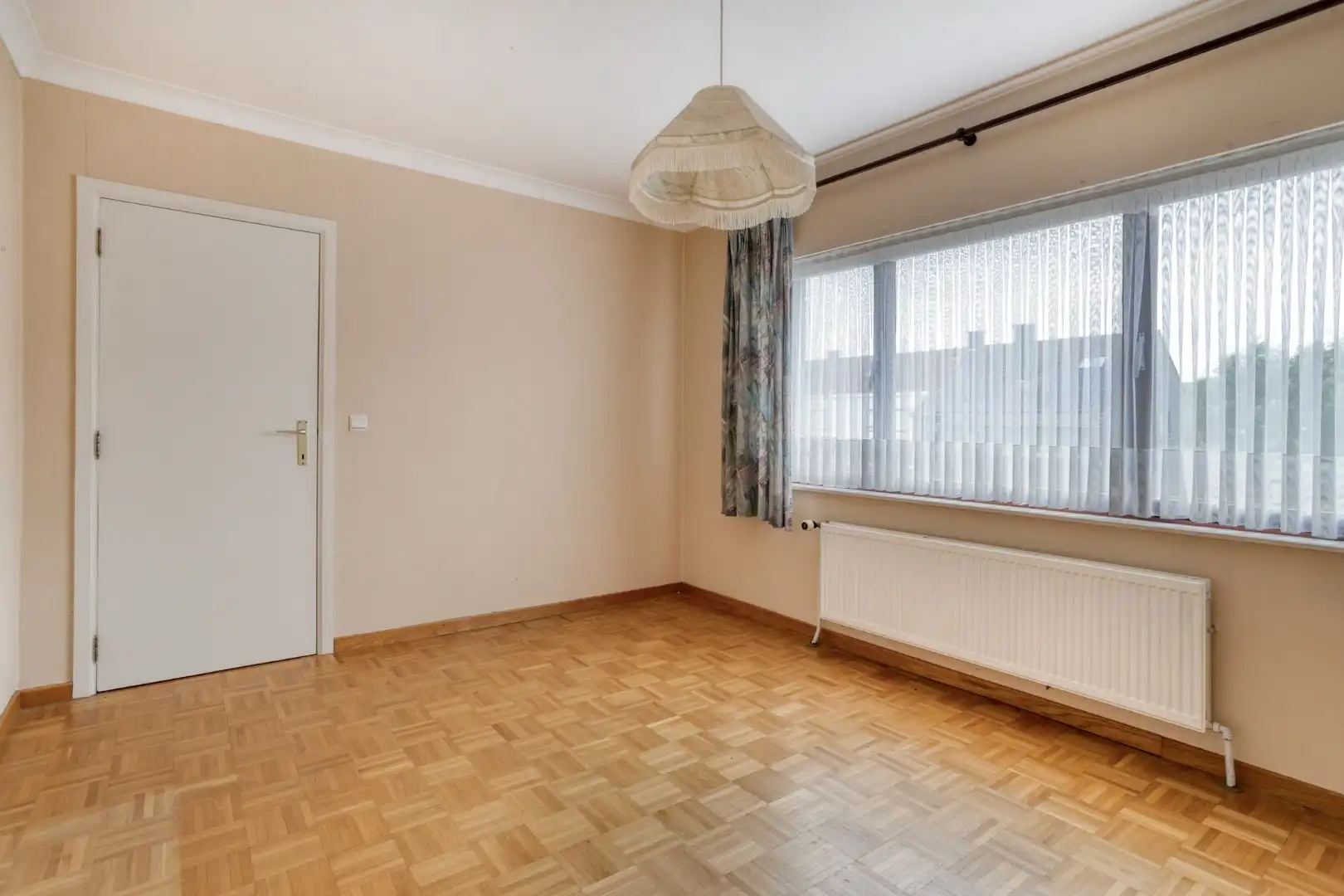 Degelijke woning met 4 slaapkamers, garage en tuin! foto 11