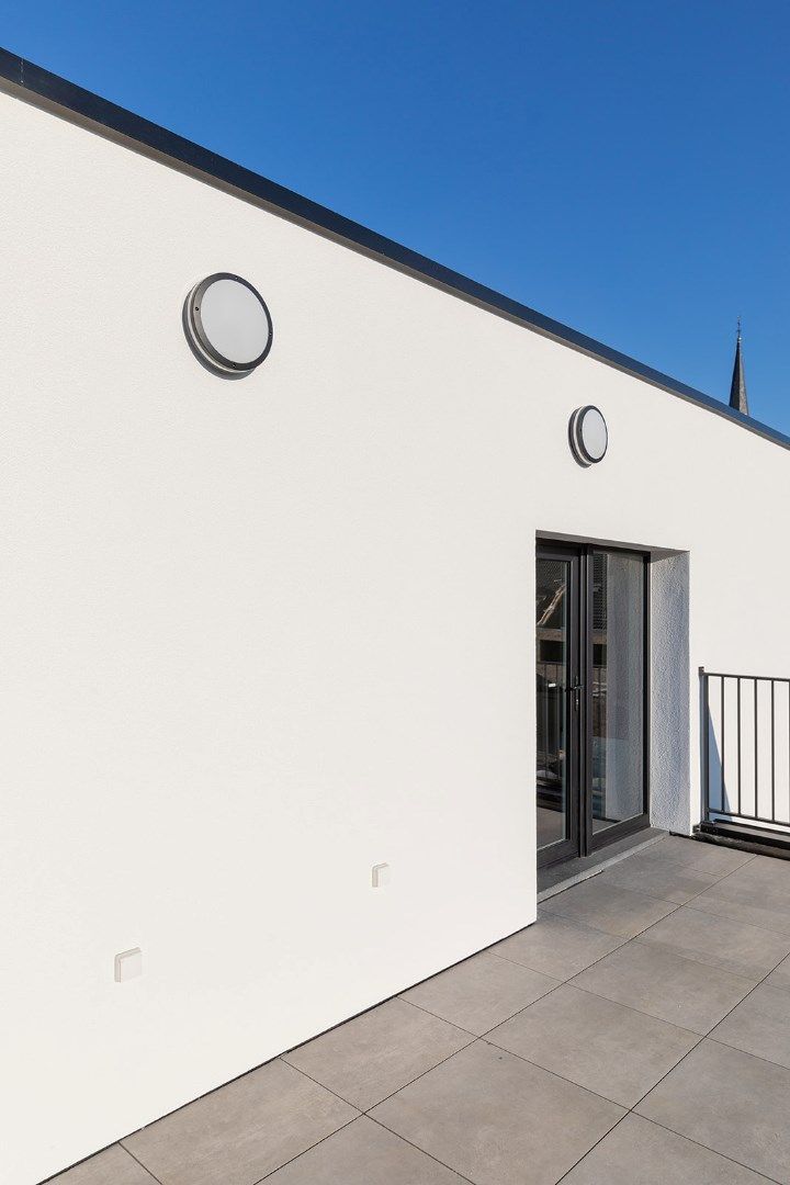 Modern ingericht instapklaar nieuwbouwappartement met 1 slpk foto 12