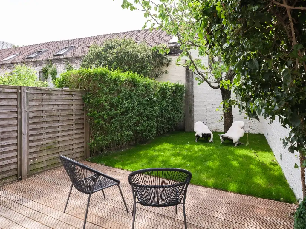 Duurzame stadswoning met 4 slaapkamers en zuidgerichte tuin nabij de Coupure foto 3