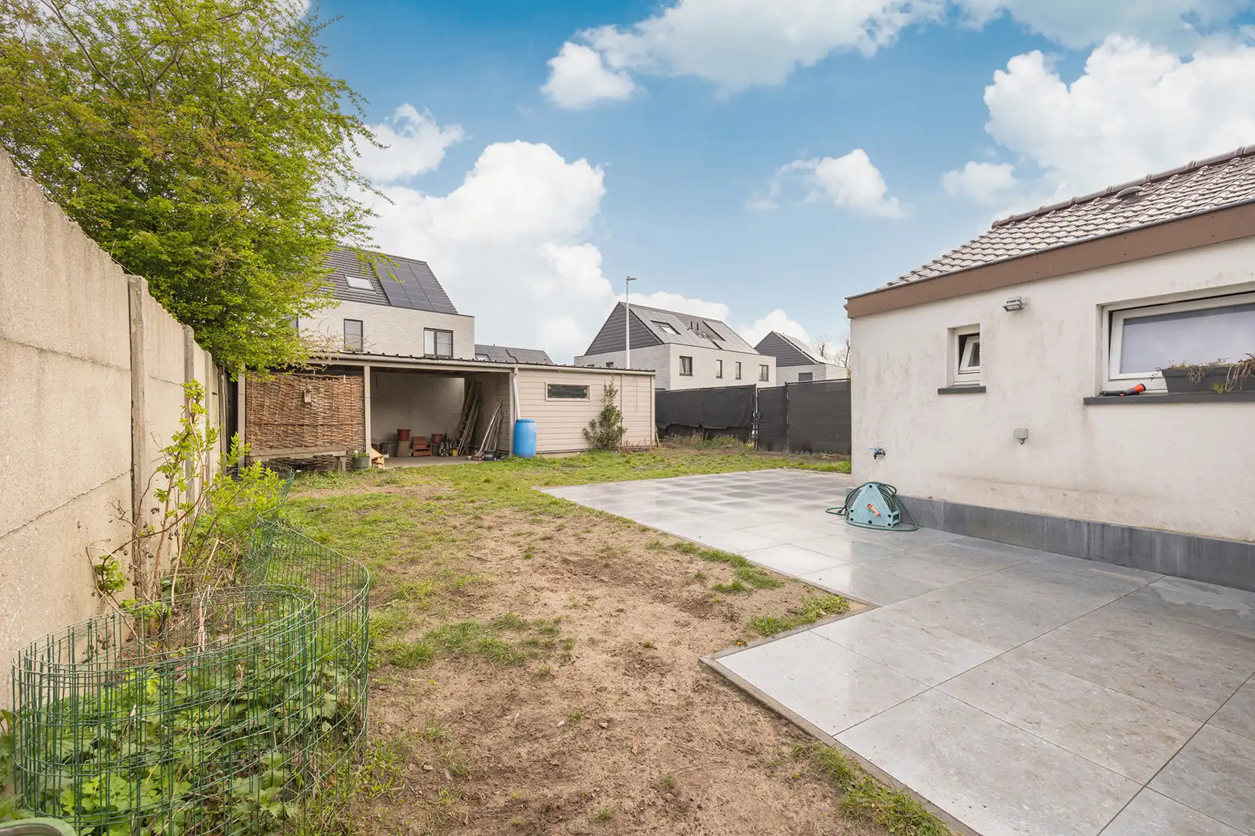 Instapklare open bebouwing in het hart van Kalken foto 14