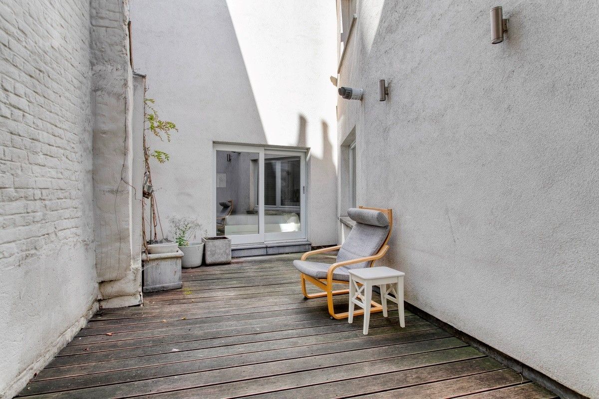 Karaktervol appartement met groot terras (20m²) in het midden van de stad aan het Karmelietenklooster en het Gravensteen. foto 5