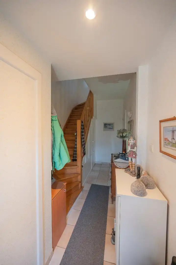 KNAPPE GEZINSWONING MET STADSTUIN TE BREDENE DUINEN foto 8