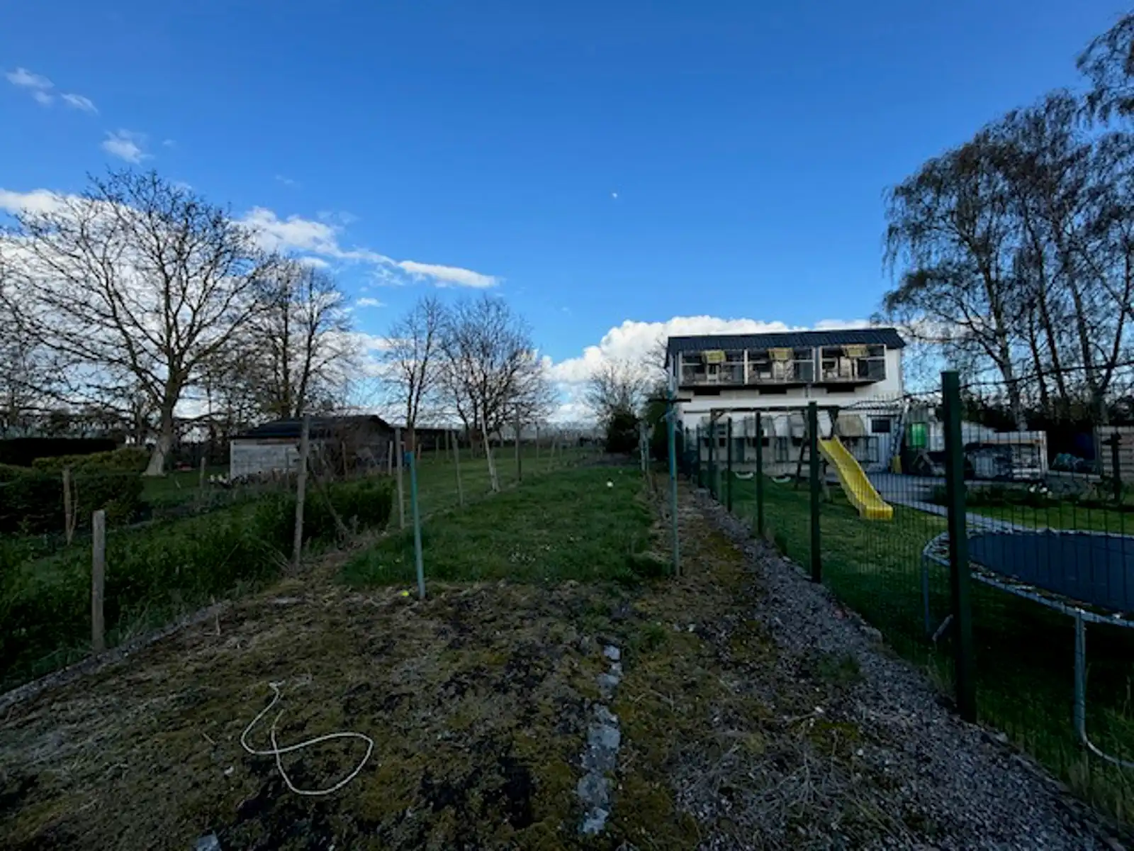 Rijwoning met zij- en achteringang te Gingelom foto 13