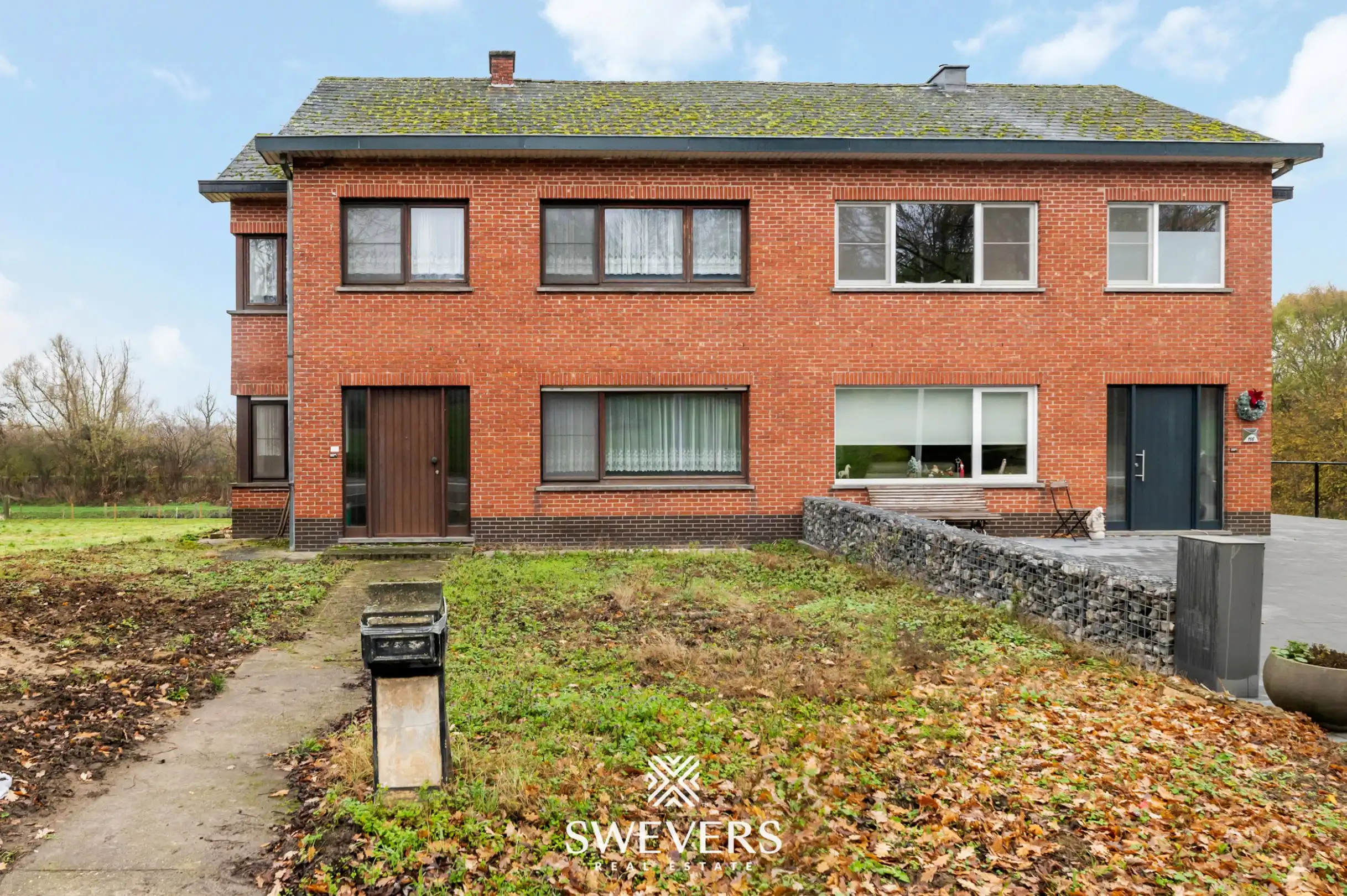 Hoofdfoto van de publicatie: Te renoveren halfopen woning met ruim perceel in Diest