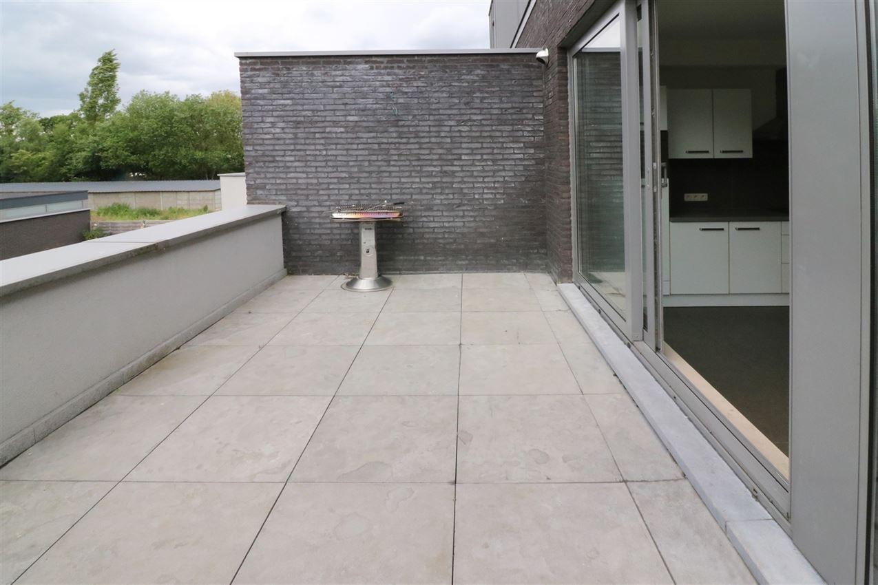 Modern duplex appartement met 2 slpk. en garage foto 13