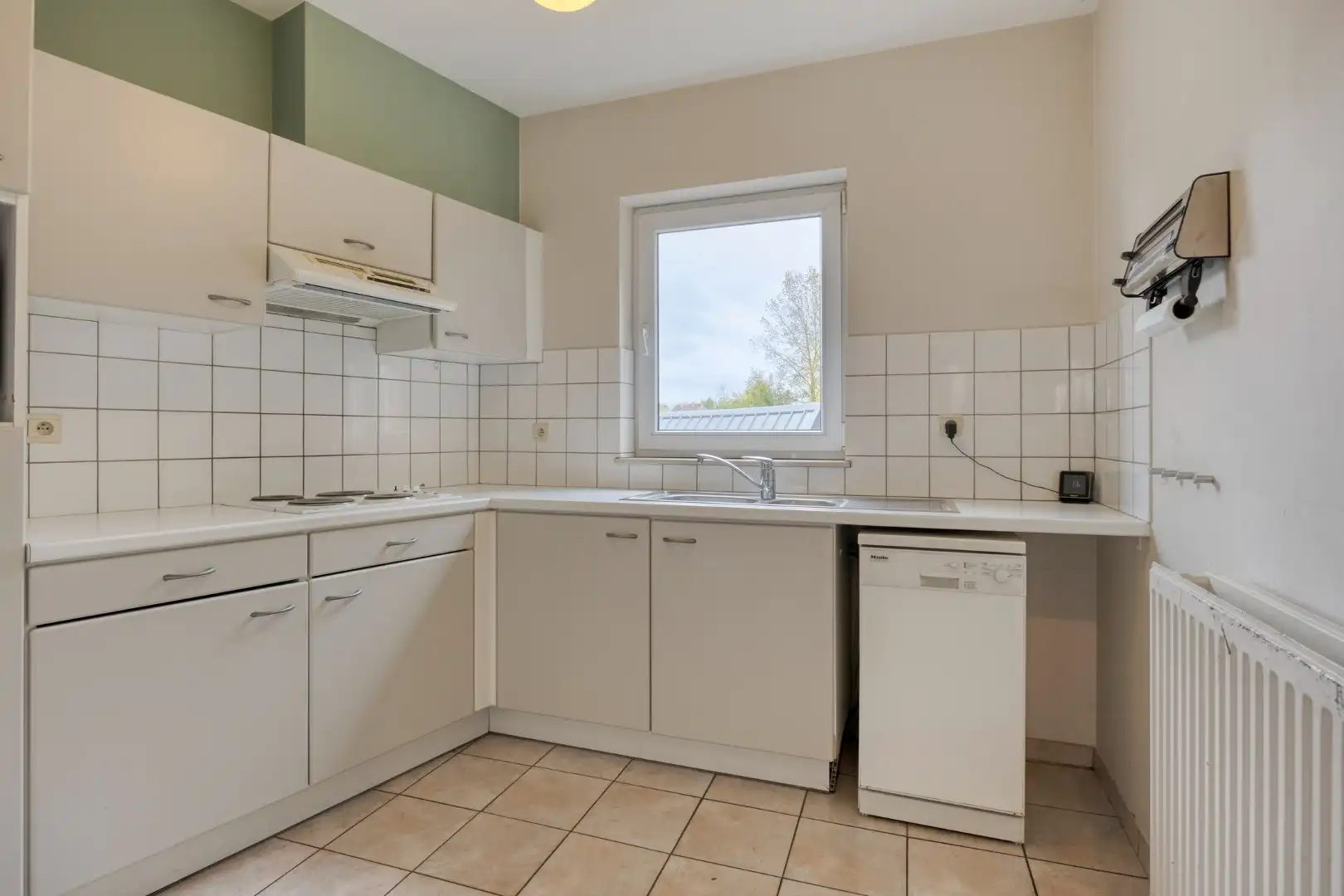 Appartement met 3 slaapkamers, autostaanplaats en terras in het centrum van Lubbeek – EPC 220 kWh/m² - bewoonbare opp. 182 m² foto 8