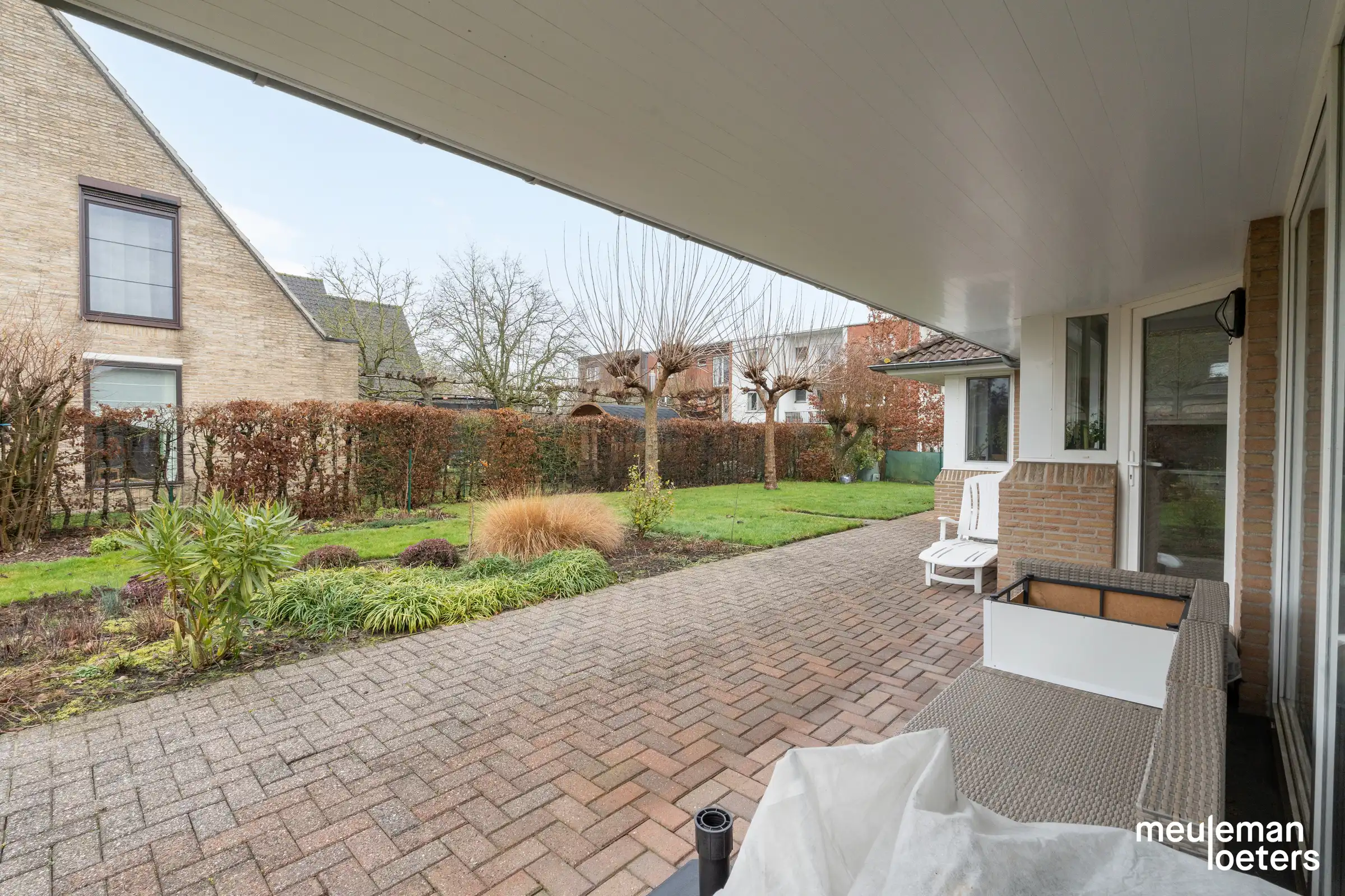 Schitterend gelegen en energiezuinige gelijkvloerse woning met tuin en garage foto 14