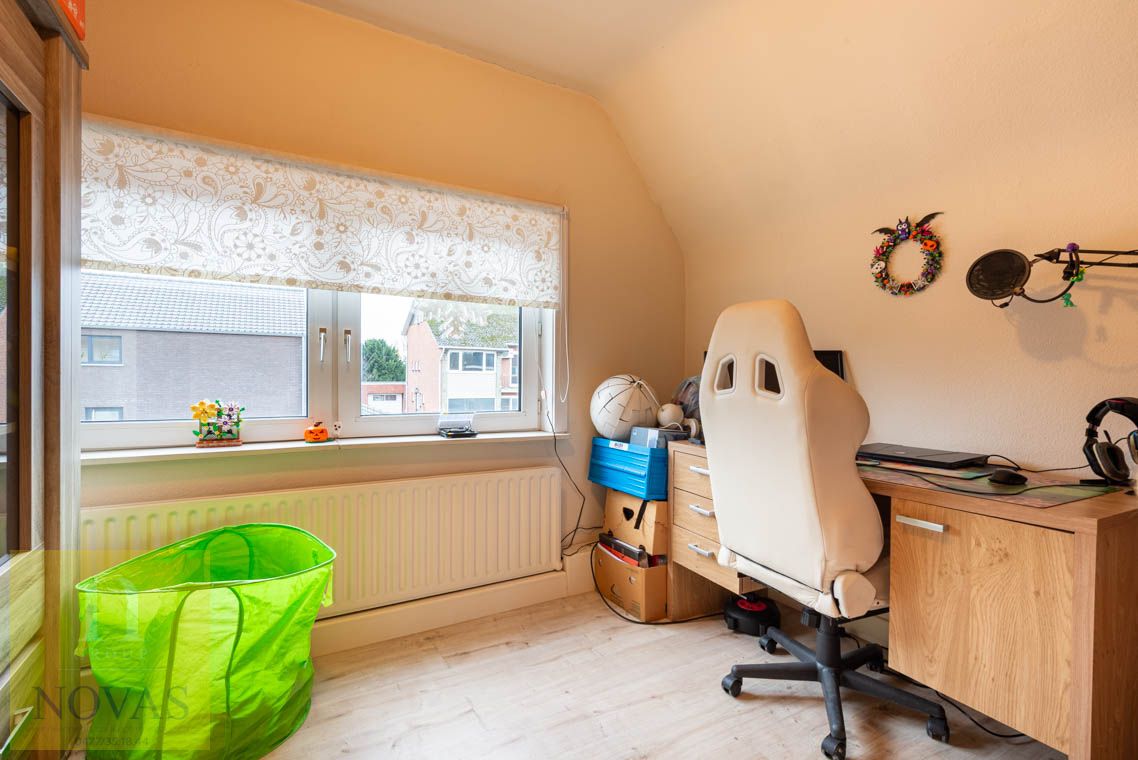 Gezellige woning met 3 slaapkamers, fijne woonkamer en diepe tuin foto 17