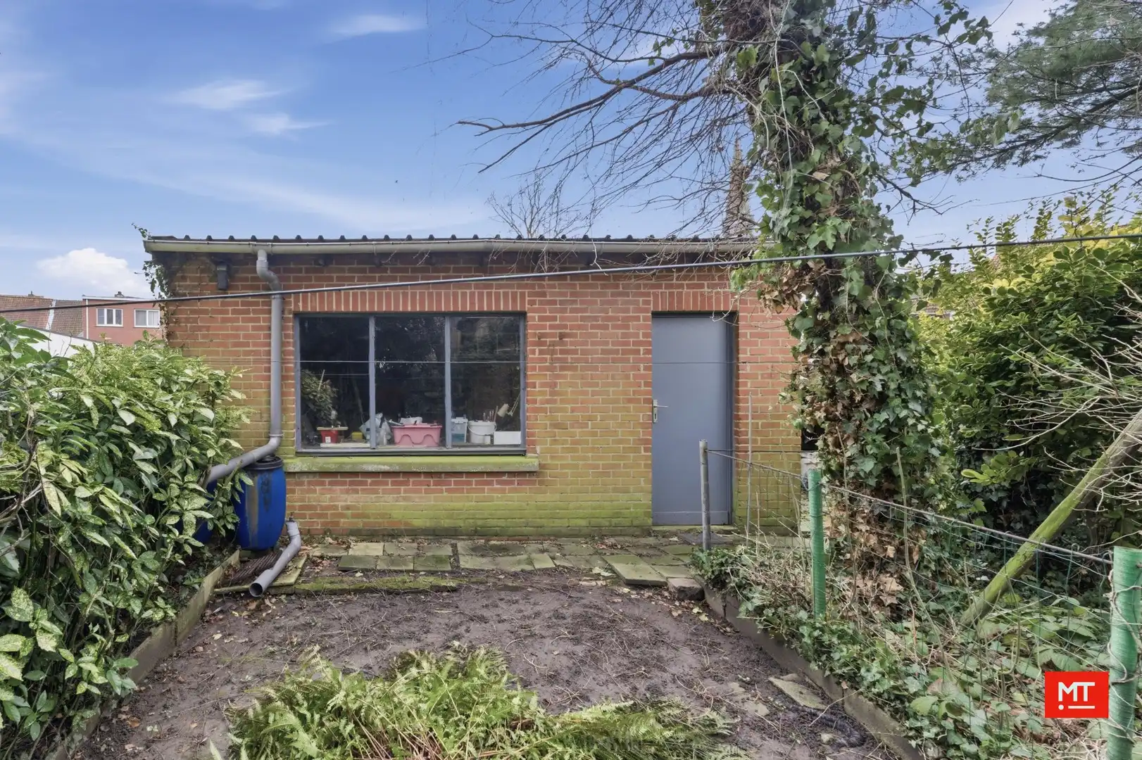 Op te frissen woning met 3 slaapkamers (+ mogelijk), garage en tuin in het centrum van Wervik foto 19