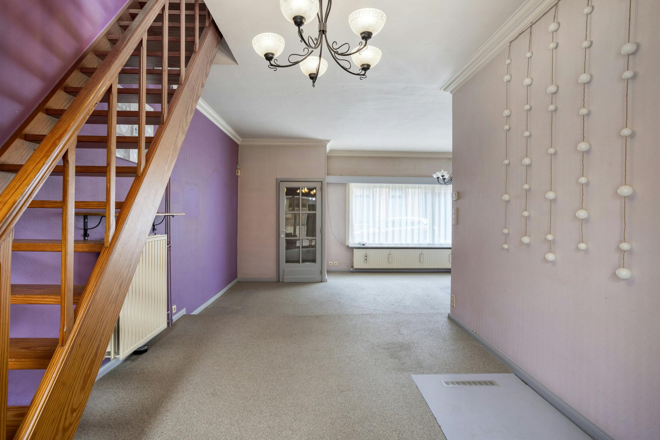 Te renoveren huis met vier slaapkamers en tuin in het centrum foto 3