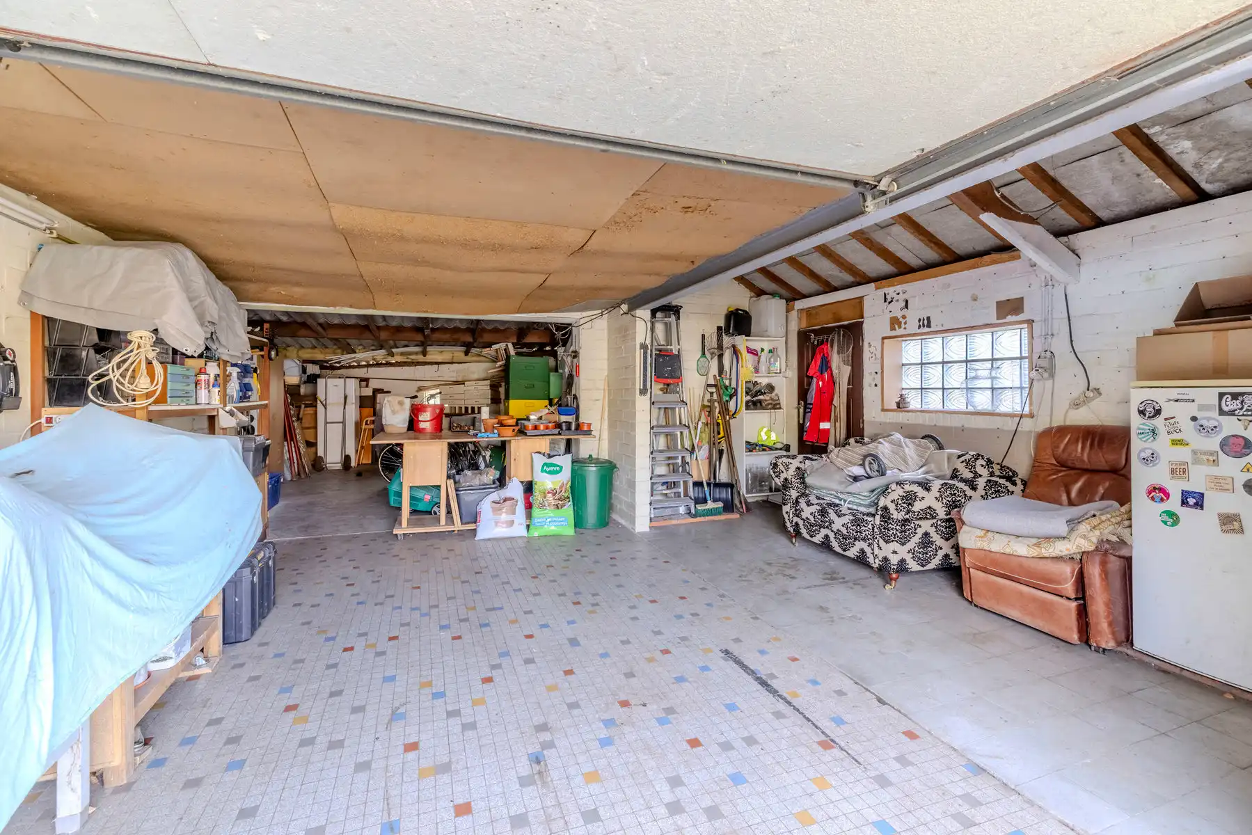 Laagbouwwoning met 2/3slpk, tuin en garage foto 28