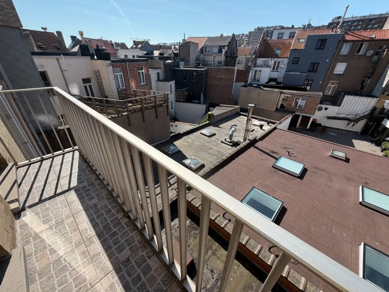 Ruim appartement te huur op de Grote Markt in Blankenberge met twee slaapkamers. Met een terrasje vooraan en achteraan- uw ideale uitvalsbasis aan de Belgische kust! foto 15