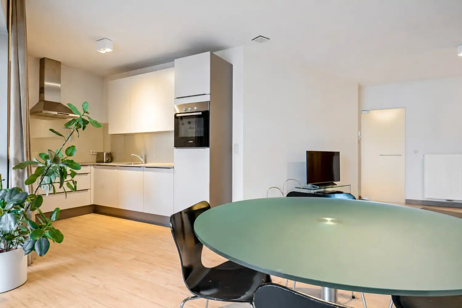 Recent gelijkvloers appartement met 2 slpkrs en stadstuintje te Mechelen foto 3