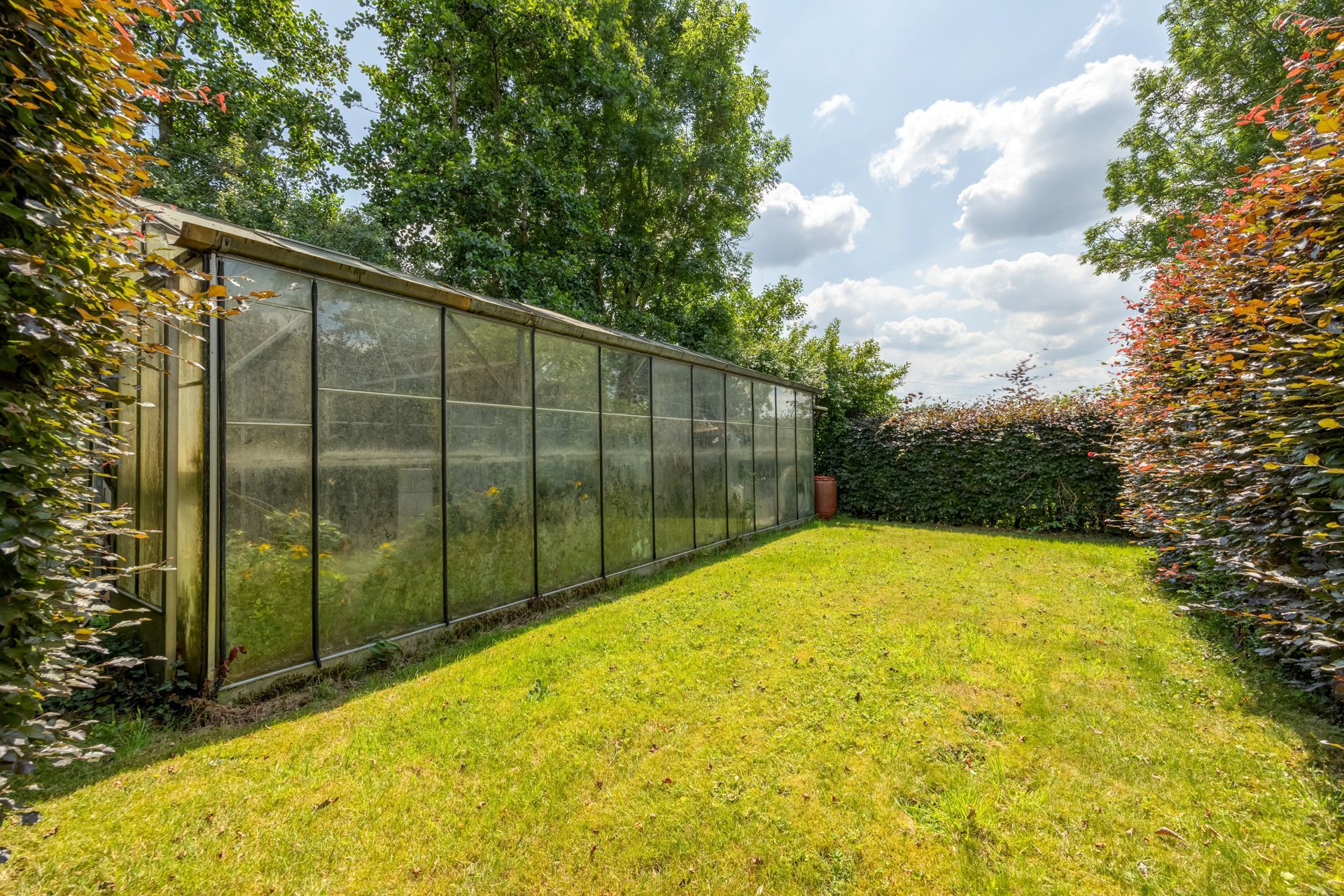 Open bebouwing met 4 slpks en grote tuin foto 25