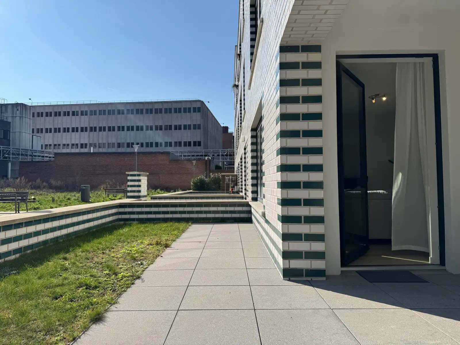 Berchem: Nieuwbouw gelijkvloers één slpk app.+ terras + P foto 9