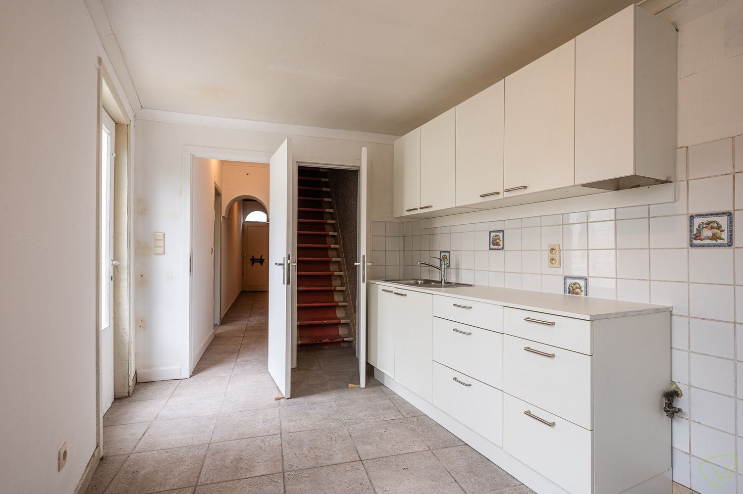 Te renoveren starterswoning met een verrassende tuin op een boogscheut van het centrum foto 8