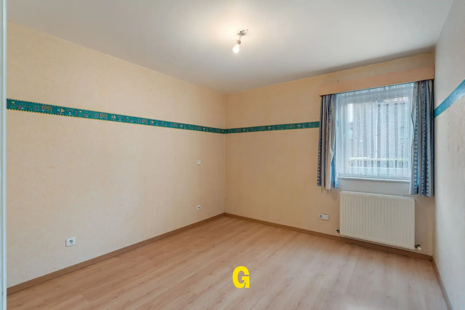 Degelijk (rolstoelvriendelijk) gelijkvoersappartement met terras uitgevend op de tuin, afsluitbare garage en berging foto 18