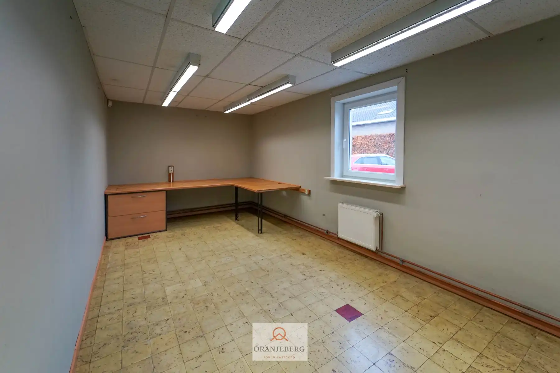 Ruim handelspand met meerdere ruimtes en parking te huur in centrum Drongen foto 20