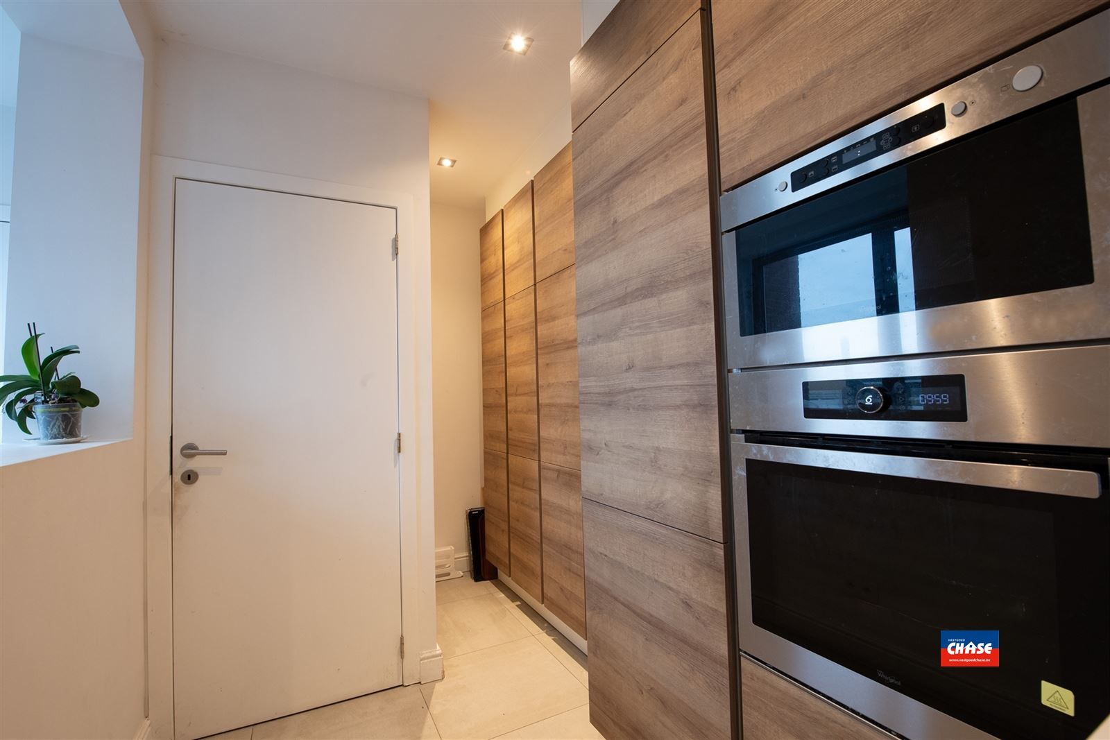 Handelshuis met groot appartement, garage en tuin foto 34