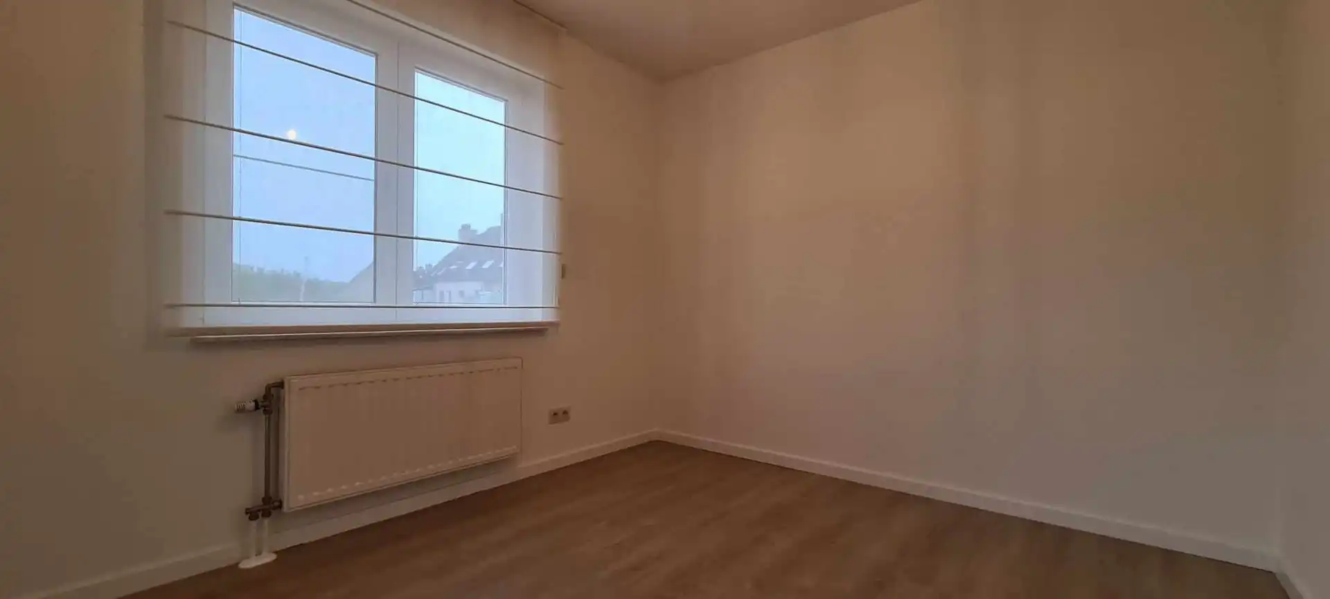 Charmant 2 slpk-appartement met autostaanplaats in residentiële buurt foto 9