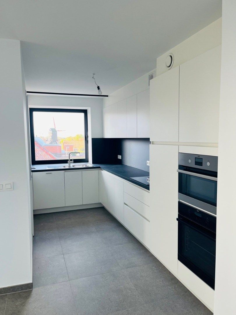 Uniek 3-slaapkamerappartement in het voormalige gemeentehuis van Vleteren foto 2