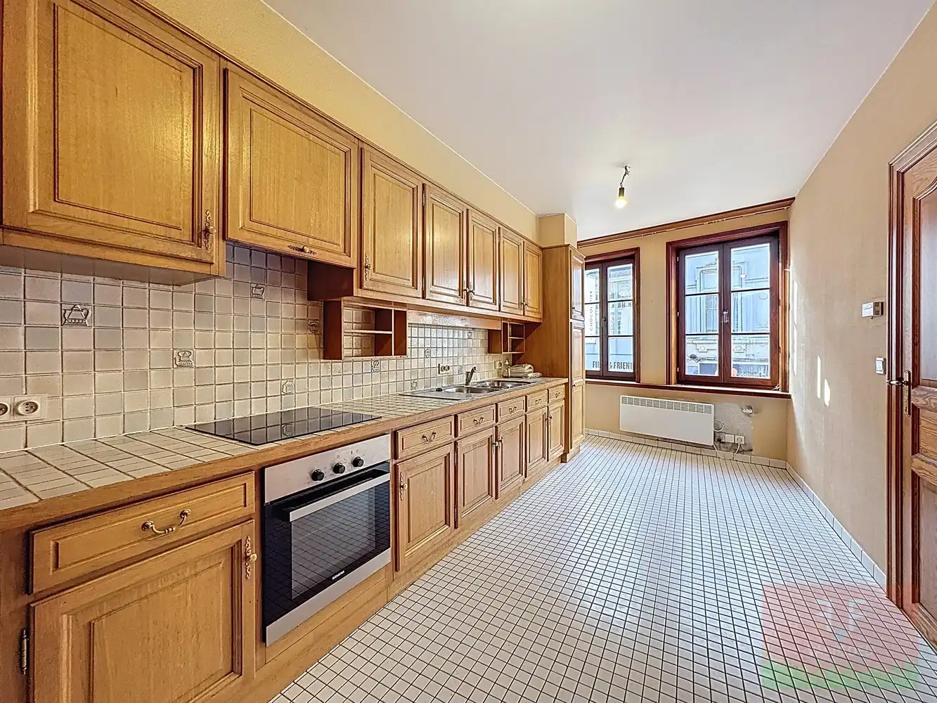 Winkelruimte en triplex appartement met 4 slaapkamers en aparte garage foto 11