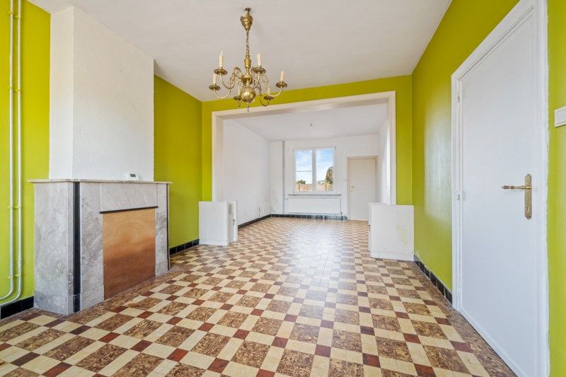 Te renoveren woning met een ruime tuin en zolder – een unieke kans! foto 3