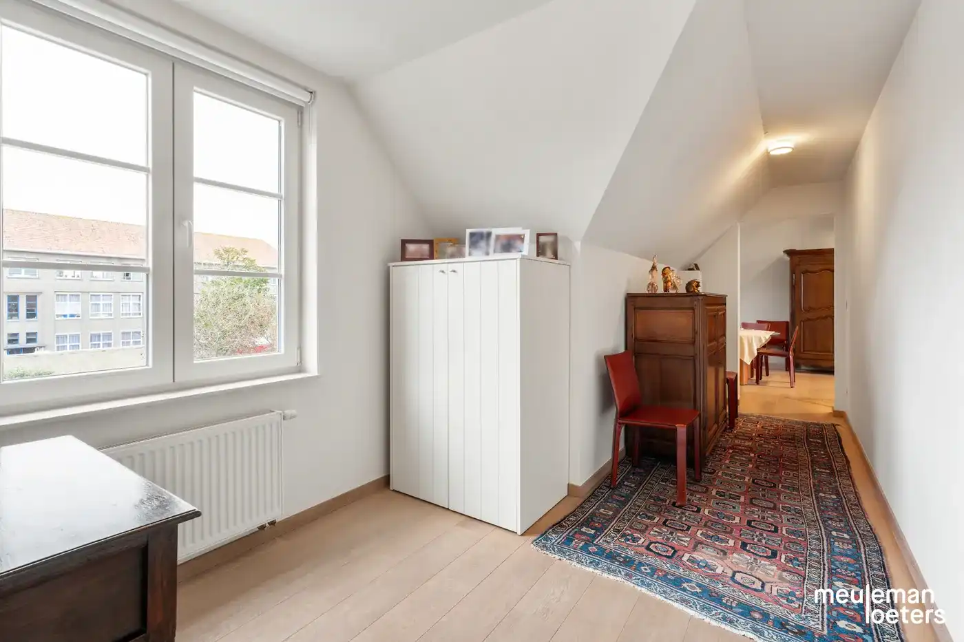 Riant en instapklaar duplexappartement met zéér ruime garagebox in centrum  foto 3