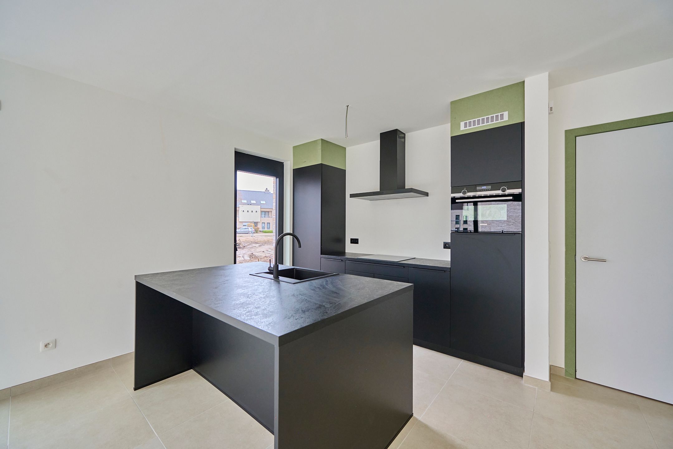 Gelijkvloers nieuwbouwappartement + privé tuintje foto 5