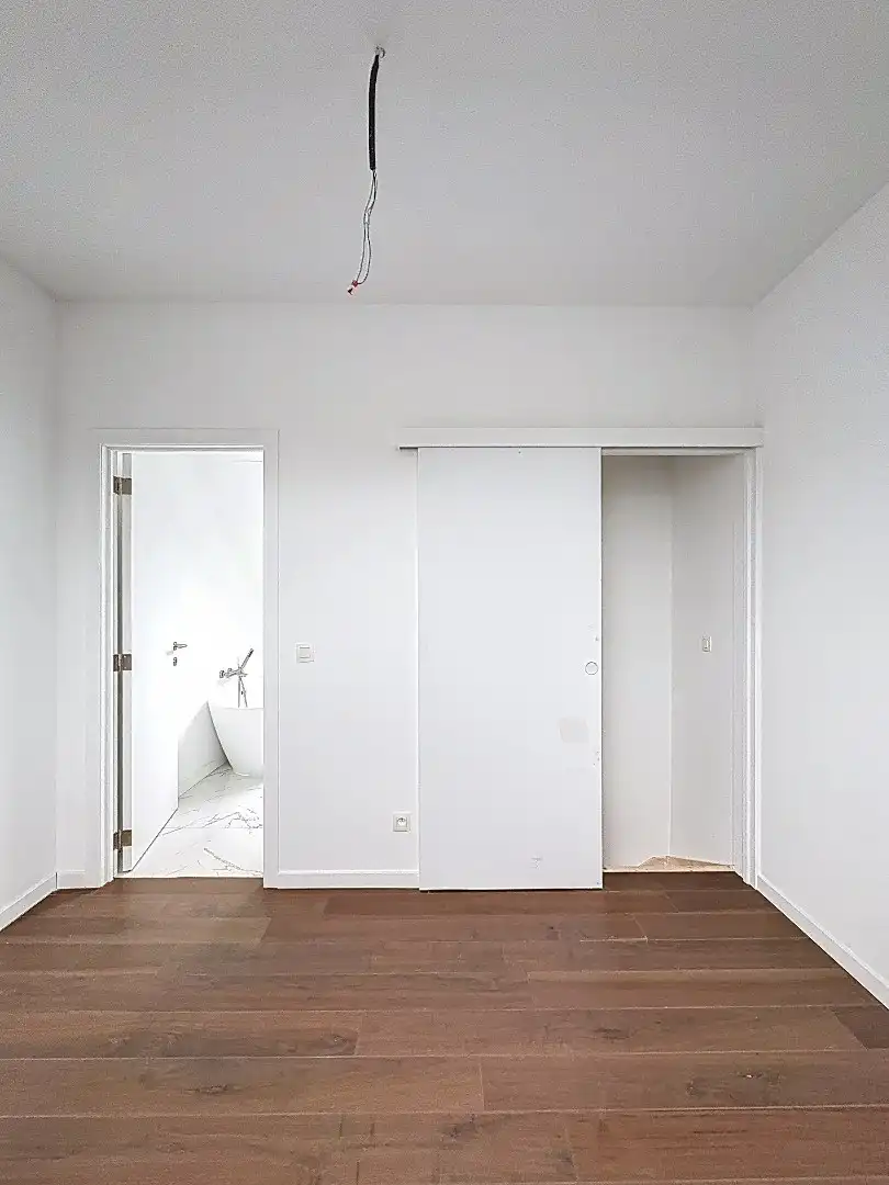 Elegant wonen in Tienen: gerenoveerde rijwoning met 3 slaapkamers en zuidwestgerichte tuin. foto 15