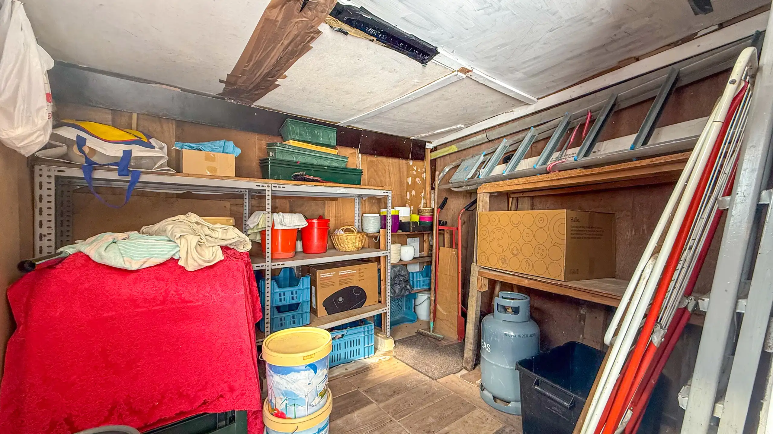 Op te frissen rijhuis met 3slpk + tuin in Sint-Truiden! foto 29