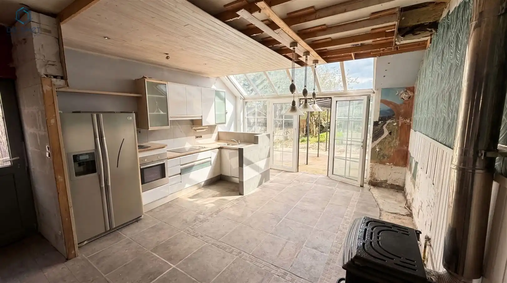 Te renoveren woning met tal van mogelijkheden in rustige buurt te Schendelbeke foto 2