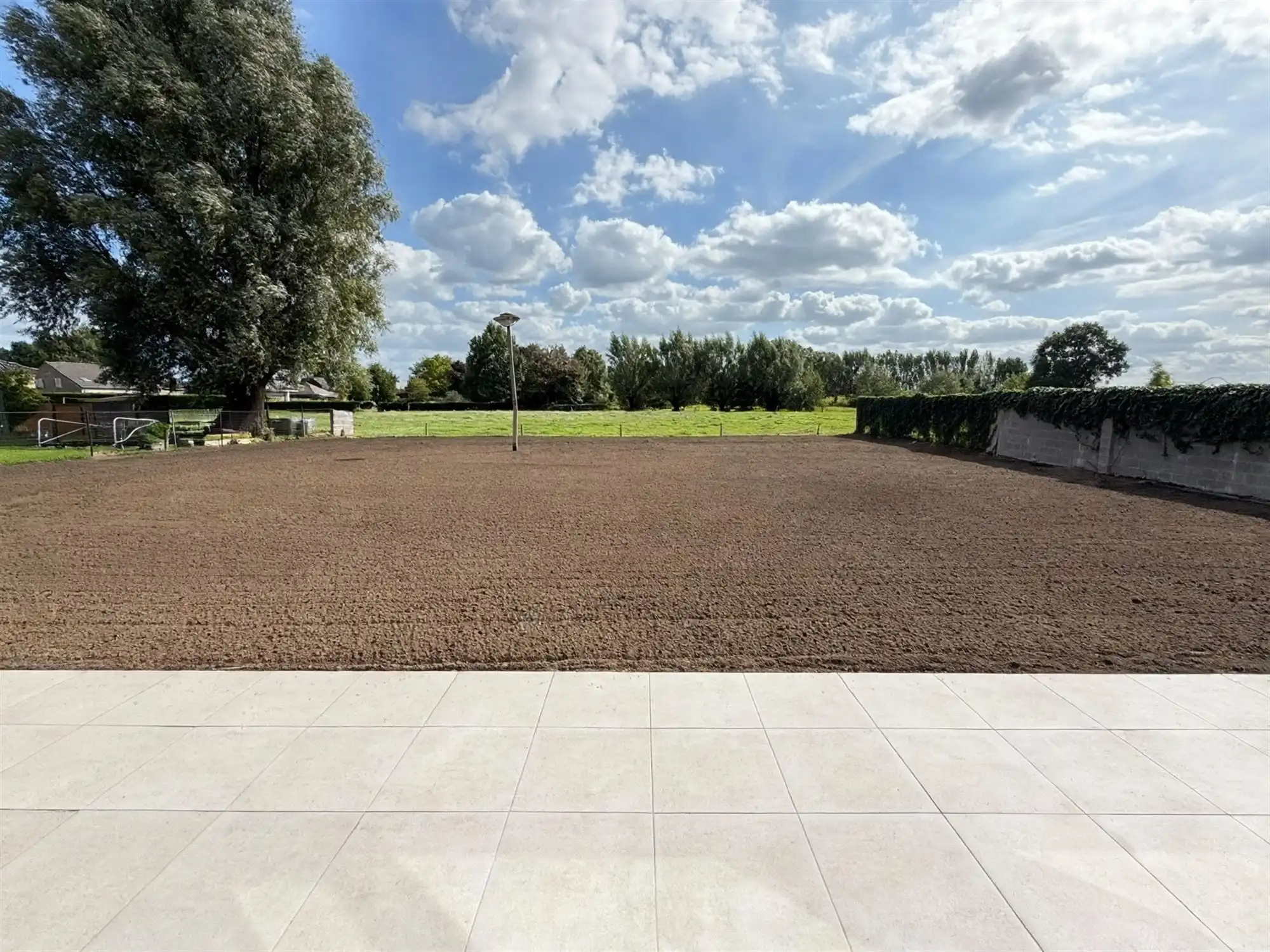 Nieuwbouwappartement met grote tuin en zonneterras foto 9