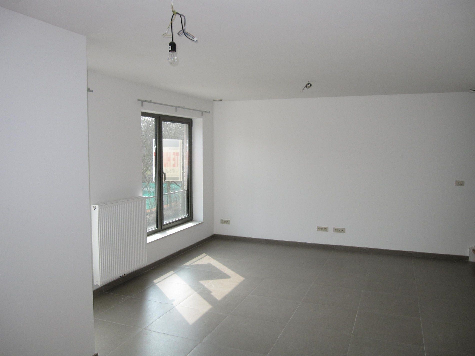 Ruim duplex-appartement met ondergrondse staanplaats en berging foto 3