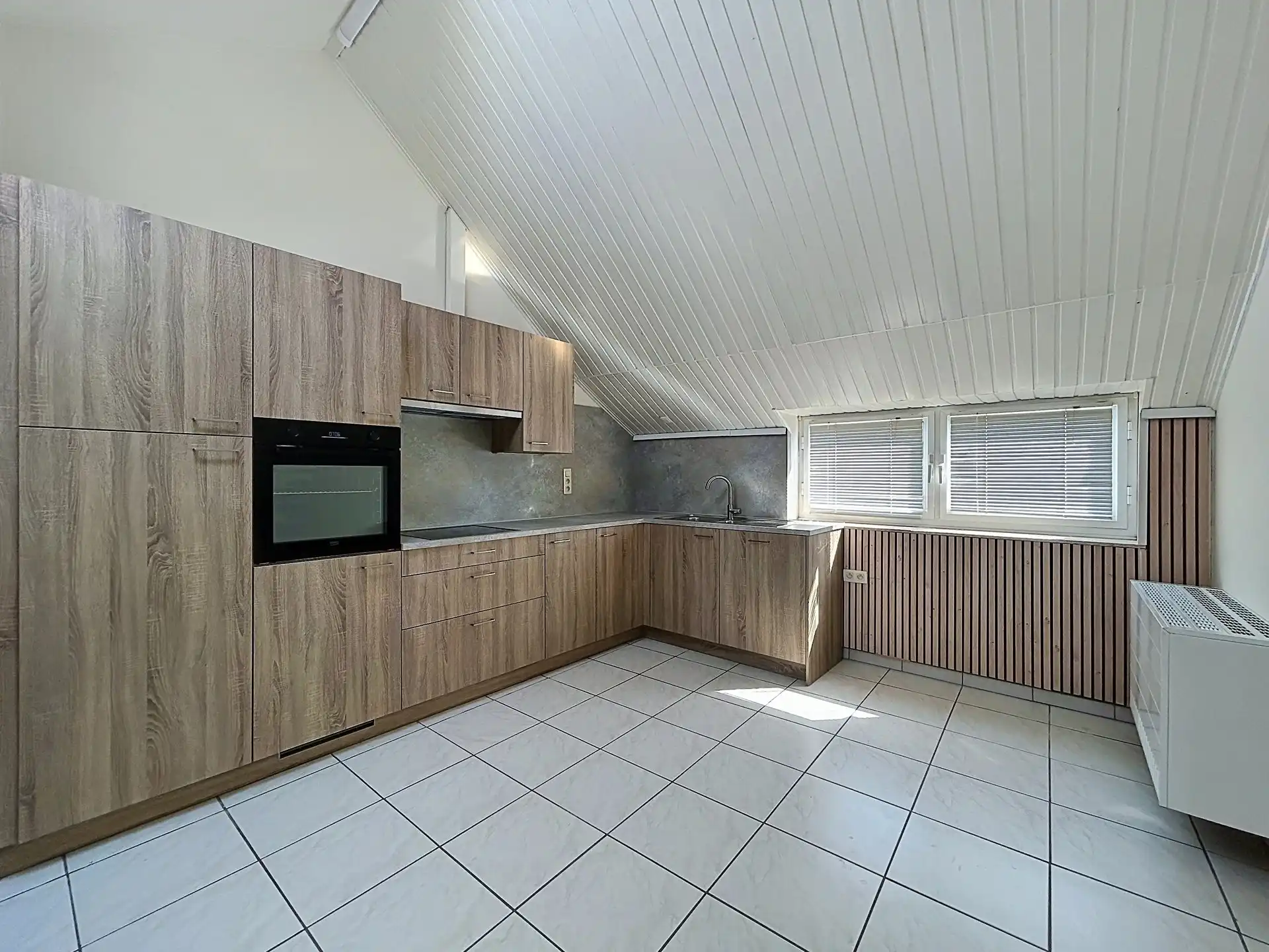 OPBRENGSTEIGENDOM MET 3 VOLLEDIG VERHUURDE APPARTEMENTEN – UITSTEKENDE INVESTERING IN SINT-PAUWELS foto 4