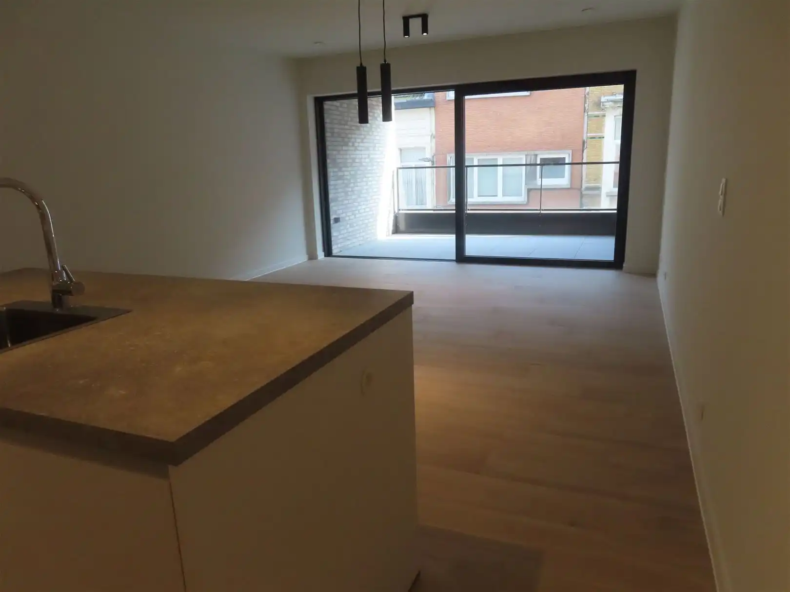 Prachtig nieuwbouwappartement met 2slpk, 2 badk, terras & P foto 3