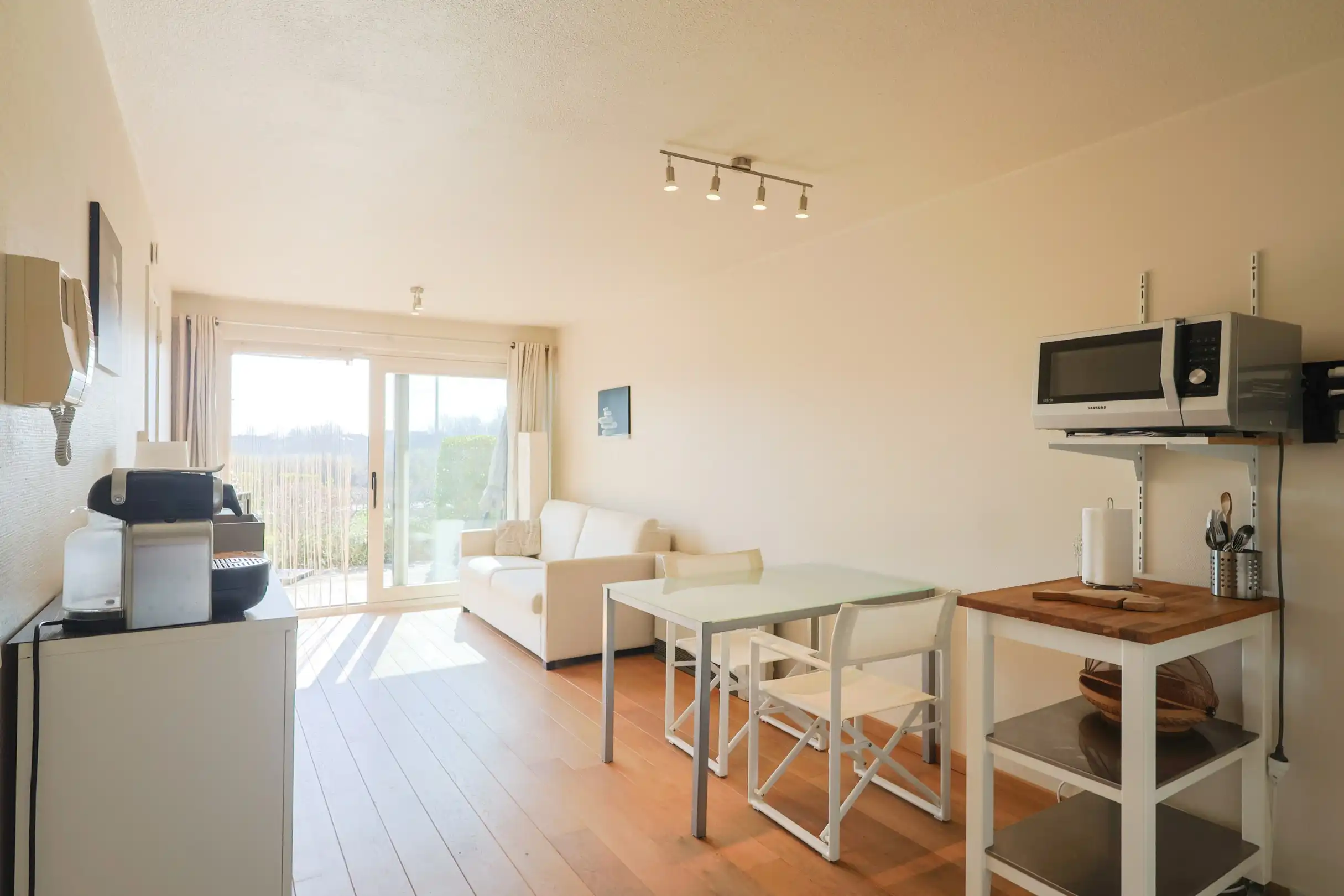 Zuidgericht gelijkvloers 1slpk appartement met zonneterras en duinenzicht nabij zee foto 3