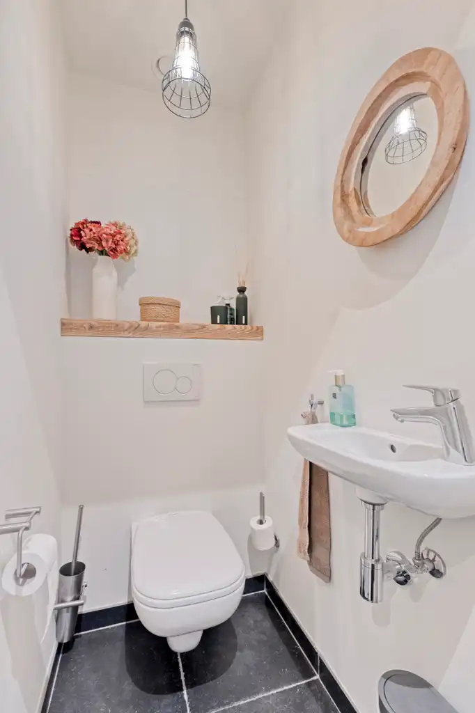 Instapklaar 2-slaapkamerappartement met tuin en garage foto 4