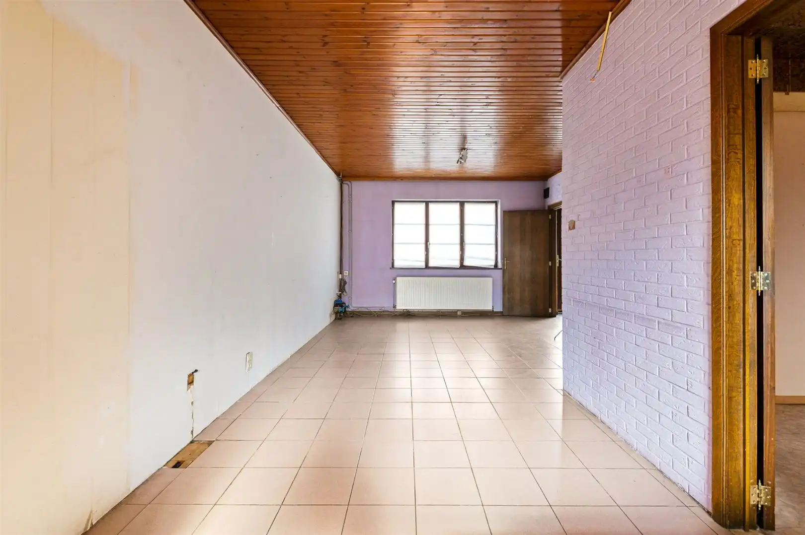 Te renoveren woning met garage in centrum foto 4