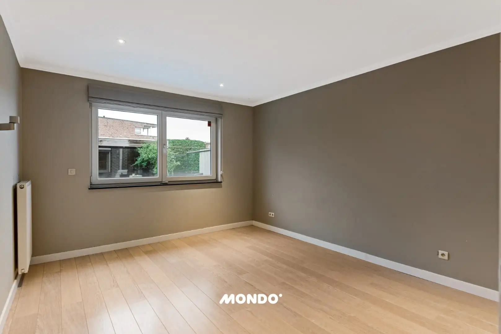 Gelijkvloers appartement met ruim terras en garage in Reet foto 10