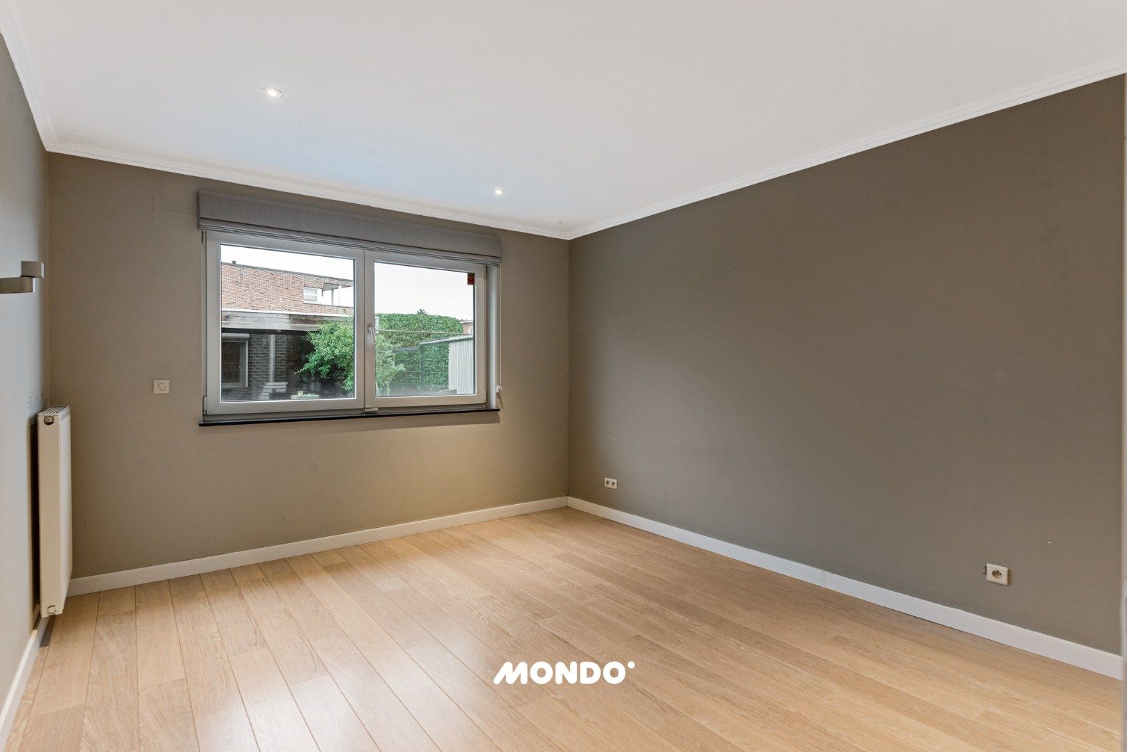 Gelijkvloers appartement met ruim terras en garage in Reet foto 10