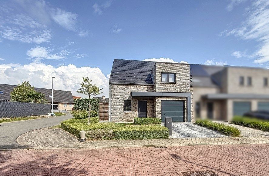 Moderne halfopen woning met tuin en garage – Rustige, centrale ligging! foto {{pictureIndex}}