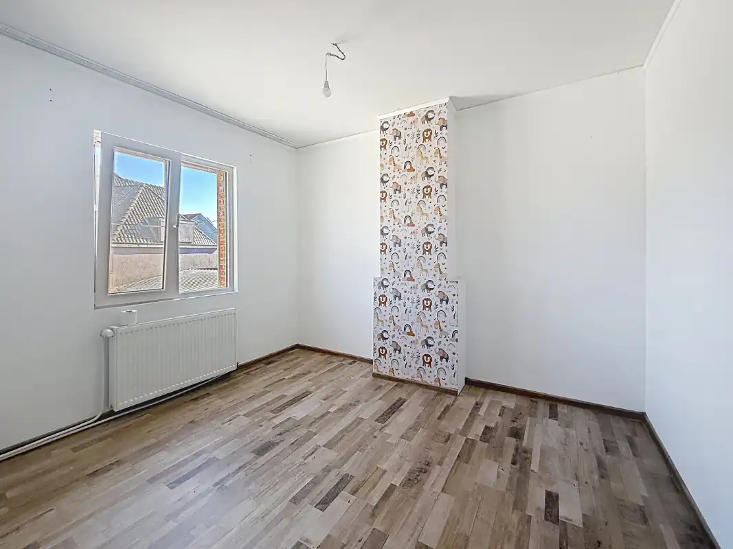 Rijwoning met 3 slaapkamers en uitweg foto 12